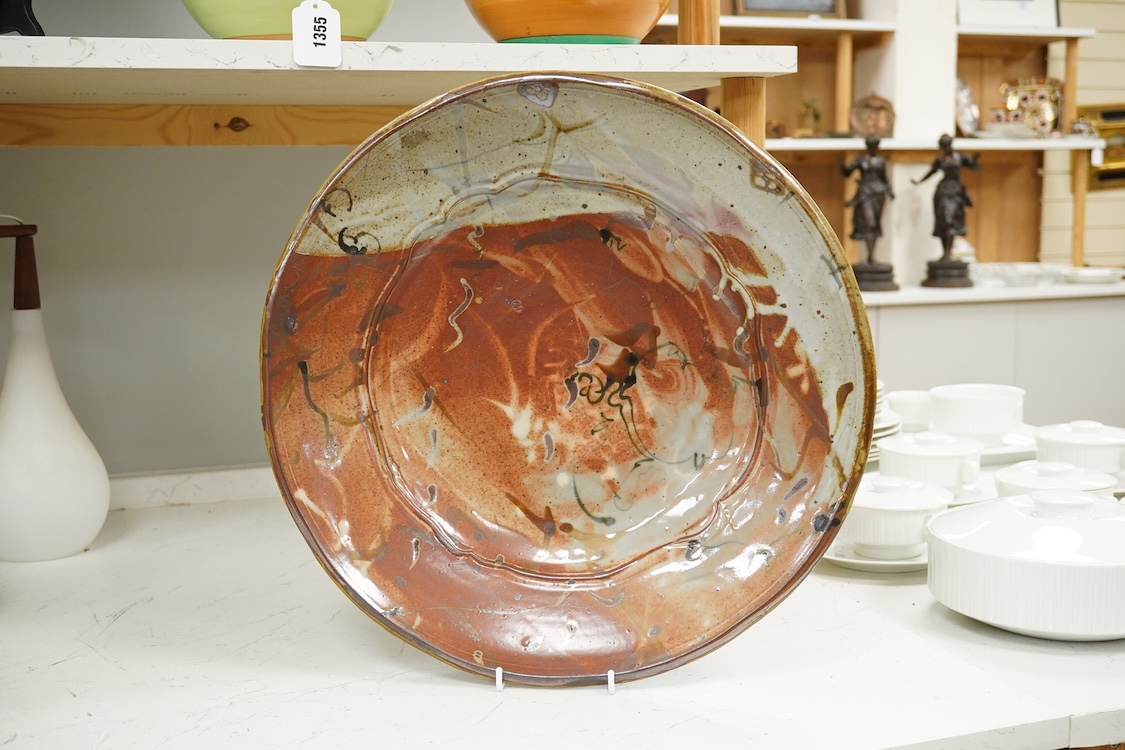 John Parker Glick (1938-2017), Plum Tree Pottery, a glazed charger, signed and stamped to the base, 43cm in diameter